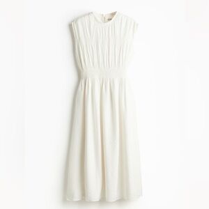 Smocked detail dress in off white